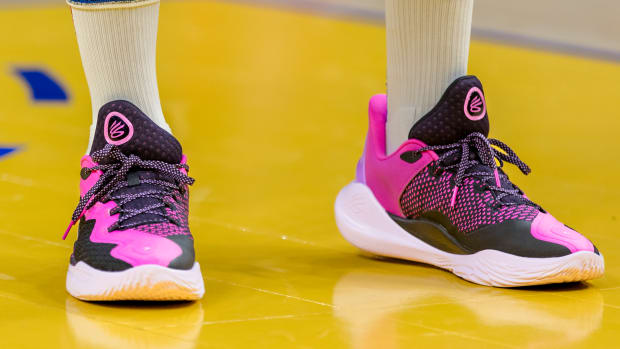 Golden State Warriors guard Stephen Curry's pink and black sneakers.